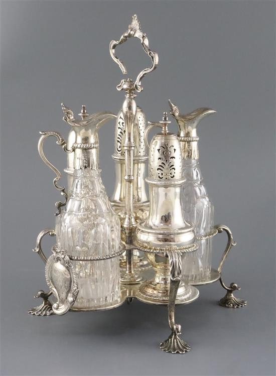 A George III silver cruet stand by Robert Hennell I, with three matching casters and two unmarked mounted glass bottles, 43.5 oz.